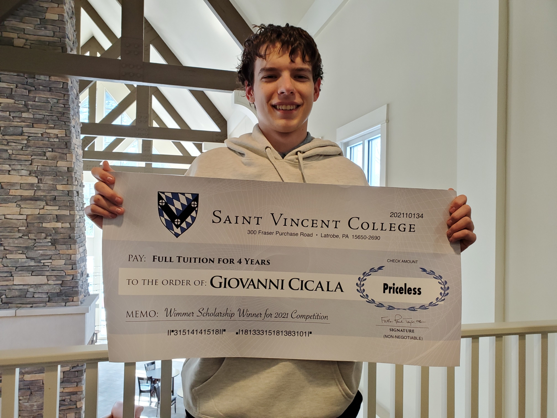Giovanni Cicala with scholarship check